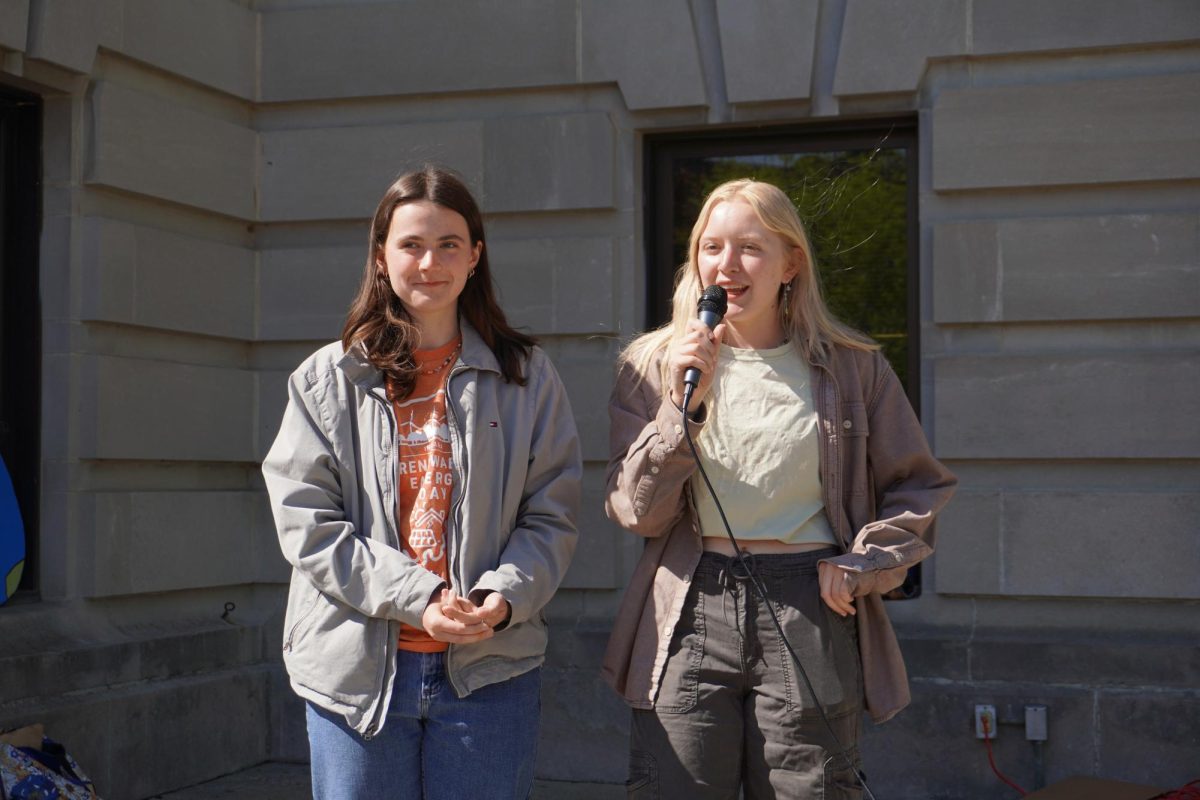 Hoosier Power Energy Rally organizers  Alice Racek (left) and Lydia Arnold (right) address the crowd