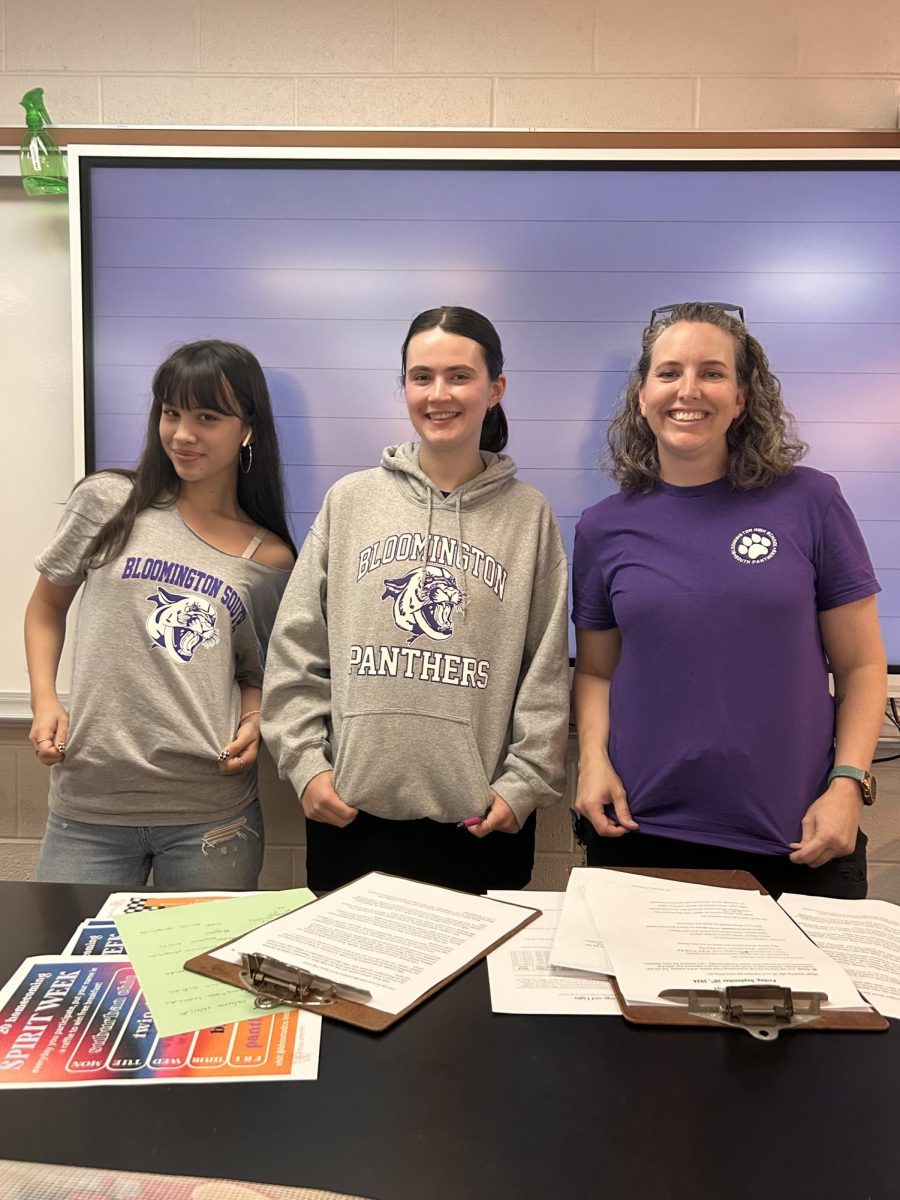 Student Council Secretary Audrey Adams (left), Vice President/Junior President Alice Racek (middle), and Teacher Sponsor Shannon Wenning (right), pose for a photo on Friday's Spirit Week "Panther Pride" day. [courtesy Alice Racek]