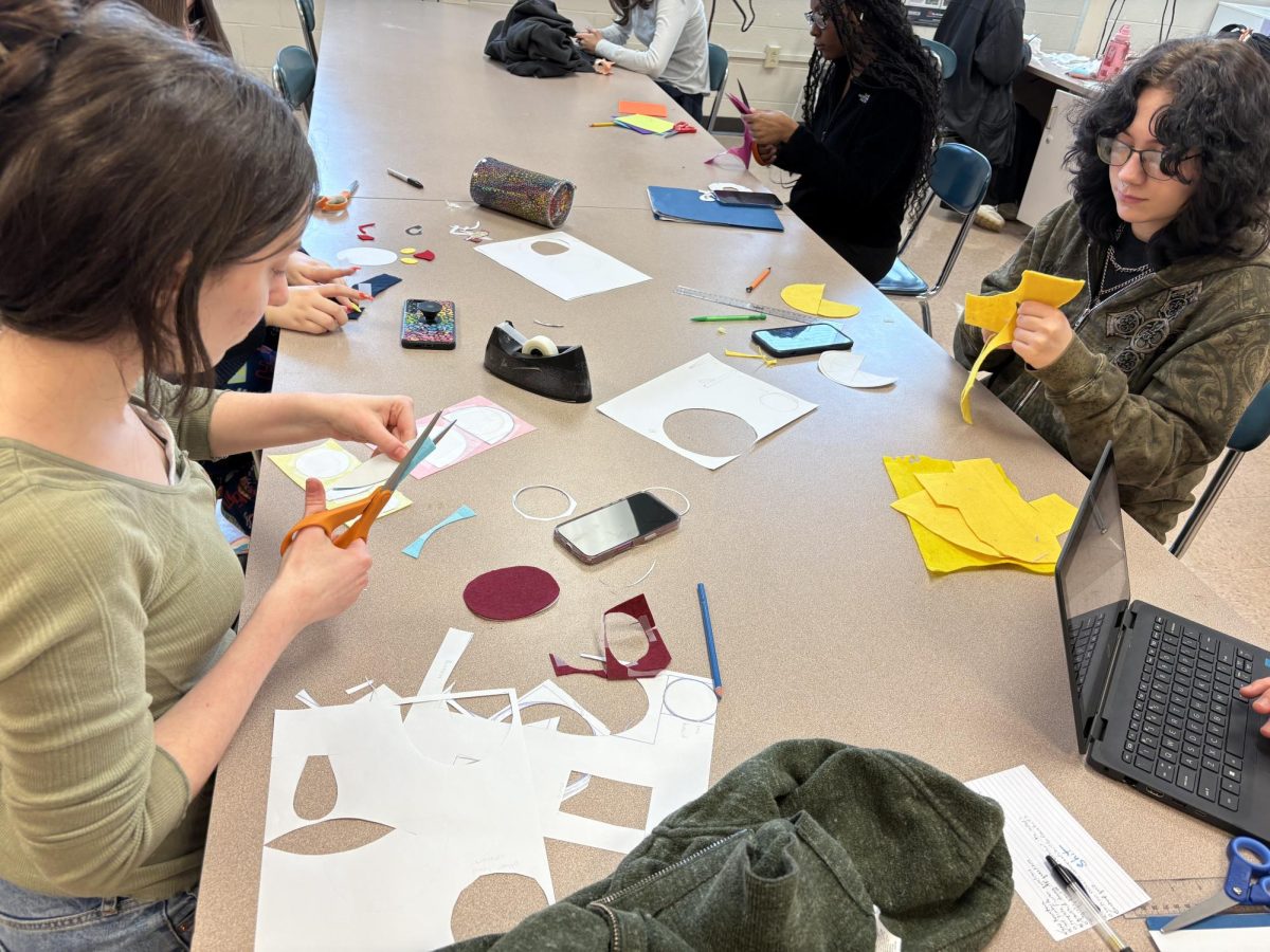 Students in Fashion and Textiles make pin cushions